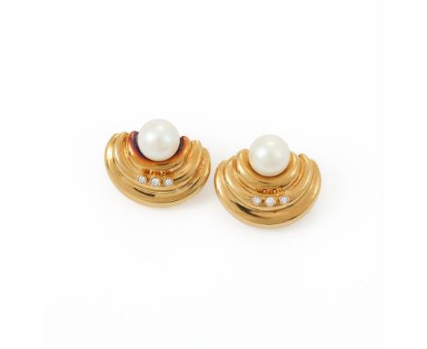 
	
		A PAIR OF CULTURED PEARL AND DIAMOND EARRINGS  
		The cultured pearls above curved gold coloured bases, each set with a 