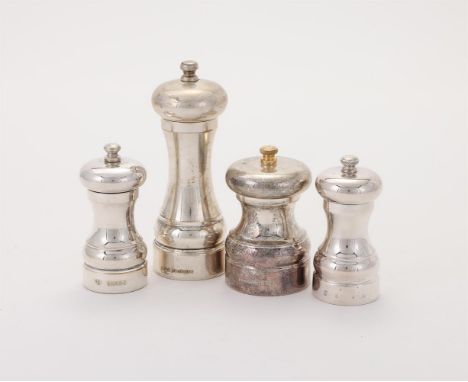 
	
		FOUR SILVER MOUNTED PEPPER MILLS
		To include: two pepper mills by Laurence R. Watson &amp; Co., London 2009, 16cm (6 1/