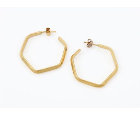 
	
		A PAIR OF 18 CARAT GOLD HEXAGONAL HOOPS 
		LONDON 1979 
		With polished sides, stud fittings, CEG maker&#39;s mark
		Siz