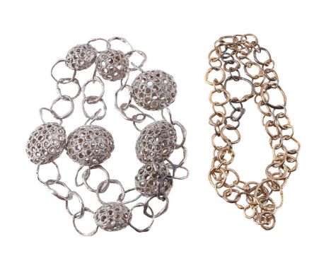 
	
		JANE WATLING, A SILVER GILT FUSED LINK NECKLACE
		LONDON 1994 
		With graduated gilt oval and shaped links, makers mark 