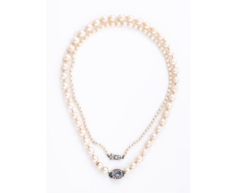
	
		TWO CULTURED PEARL NECKLACES 
		The first with graduated cultured pearls on a knotted strand, to an eight cut diamond ac