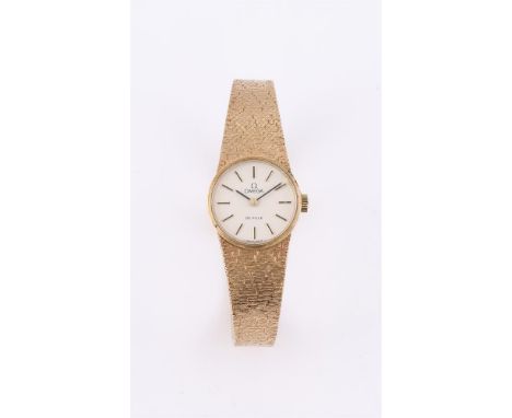 
	
		OMEGA, DE VILLE
		A LADY&#39;S 9 CARAT GOLD BRACELET WATCH, NO. 7115528, CIRCA 1972
		Movement: Cal.620, manual wind, 17
