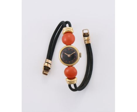 
	
		Y&nbspUNIVERSAL GENEVE FOR ASPREY 
		A LADY&#39;S 18 CARAT GOLD AND CORAL WRIST WATCH, NO. 612994, CIRCA 1937
		Movement