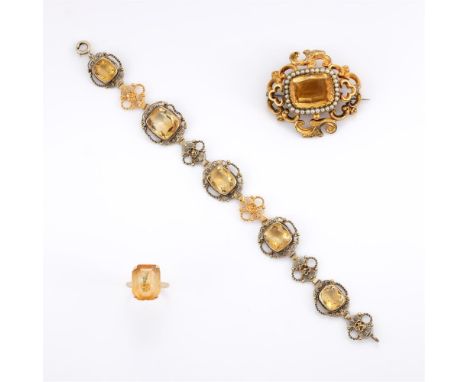 
	
		A SMALL COLLECTION OF CITRINE JEWELLERY 
		Comprising a citrine dress ring, the step cut citrine with canted corners, in