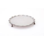 A LATE VICTORIAN SILVER SHAPED CIRCULAR SALVER