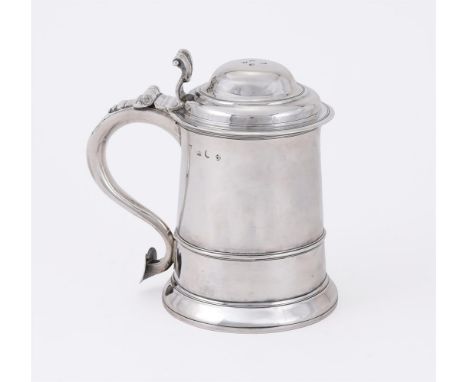 
	
		A GEORGE II SILVER TANKARD
		POSSIBLY BY RICHARD BAYLEY, LONDON 1736
		With a scroll thumb piece to the ogee domed cover