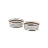 A PAIR OF GEORGE IV SILVER COASTERS