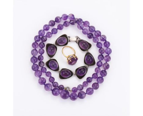 
	
		A SMALL COLLECTION OF AMETHYST JEWELLERY
		To include an amethyst and 18 carat gold dress ring, Birmingham 1994, the ova