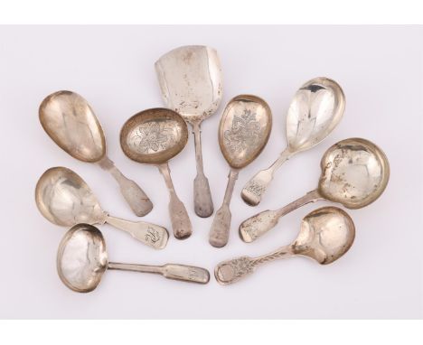 
	
		NINE SILVER FIDDLE PATTERN CADDY SPOONS
		To include: a George III caddy spoon, London 1808, engraved R, 9cm (3 1/2in) l
