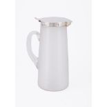 A SILVER MOUNTED AND ETCHED GLASS TAPERING JUG