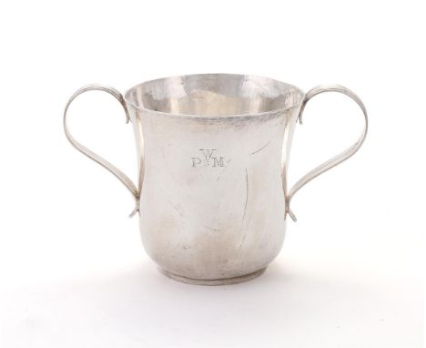 
	
		A GEORGE III SILVER TWIN HANDLED CUP
		WILLIAM CRIPPS, LONDON 1761
		With twin scroll handles and engraved W over P*M
		