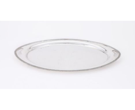 
	
		A SILVER OVAL TWIN HANDLED TRAY
		ELKINGTON &amp; CO., BIRMINGHAM 1938
		With pierced handles and a gadrooned border
		6
