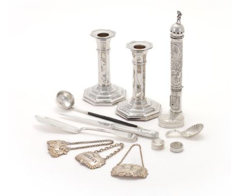 
	
		A COLLECTION OF SILVER ITEMS
		To include: a pair of Edwardian octagonal candlesticks by S. Blanckensee &amp; Son Ltd., 