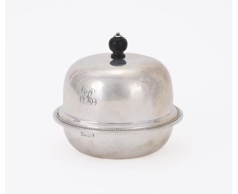 
	
		AN EDWARDIAN SILVER MUFFIN DISH
		HUKIN &amp; HEATH, LONDON 1901
		With a wooden ball finial to the domed cover, engrave