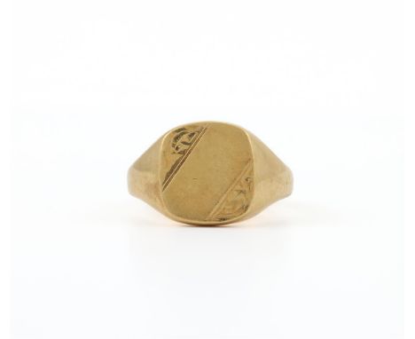 
	
		AN 18 CARAT GOLD SIGNET RING 
		BIRMINGHAM 1989 
		The cushion shaped panel with chased detail, to tapering gold shoulde