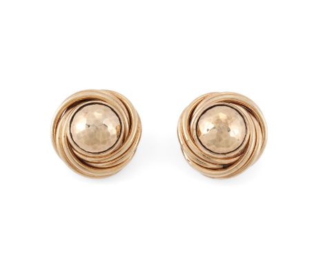
	
		DEAKIN AND FRANCIS, A PAIR OF 9 CARAT GOLD KNOT EAR CLIPS 
		BIRMINGHAM 1992
		The central circular hammered panel withi