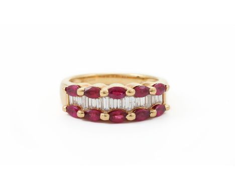 
	
		A RUBY AND DIAMOND BAND RING 
		The two rows of marquise cut rubies with a row of baguette cut diamonds between, approxi