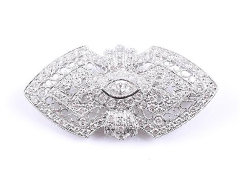 
	
		A DIAMOND PANEL BROOCH
		The pierced panel set throughout with brilliant cut diamonds, with a central marquise cut diamo