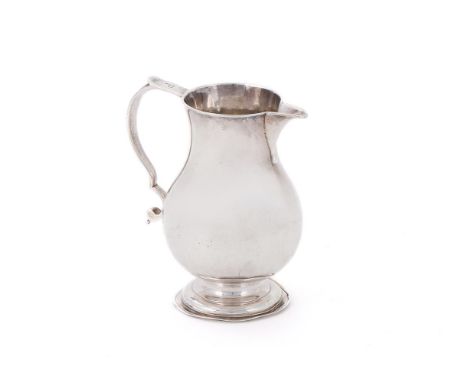 
	
		A GEORGE II SILVER BALUSTER SPARROW BEAK CREAM JUG
		MAKER&#39;S MARK OBSCURED, LONDON 1736
		The double scroll handle e