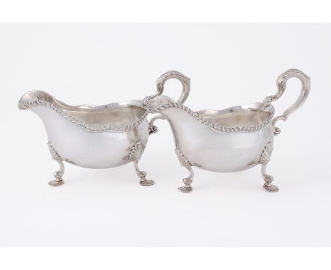 
	
		A PAIR OF GEORGE III SILVER OVAL SAUCE BOATS
		DANIEL SMITH &amp; ROBERT SHARP, LONDON 1764
		With gadrooned border, lea