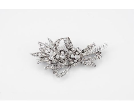 
	
		A MID 20TH CENTURY DIAMOND SPRAY BROOCH 
		The spray with pierced trefoil leaves amongst foliage, with ribbon detail, se