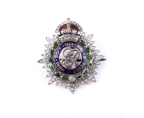 
	
		GEORGE VI, A MID 20TH CENTURY DIAMOND AND ENAMEL SWEETHEART BROOCH 
		The central panel pierced with GR VI with blue ena