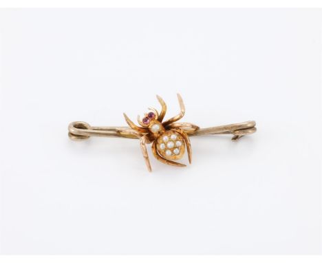 
	
		AN EDWARDIAN AND LATER SPIDER BAR BROOCH 
		The spider with a pav&#233; set half pearl abdomen and thorax, with cabochon