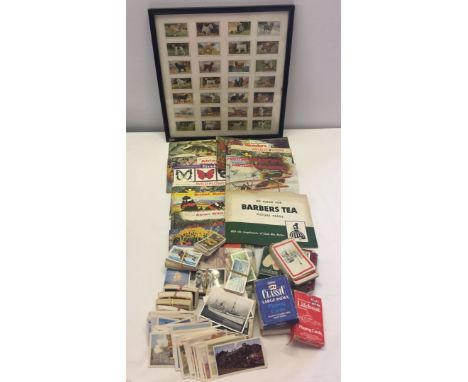 A collection of collectors tea and cigarette cards and albums together with a quantity of playing cards and a framed & glazed