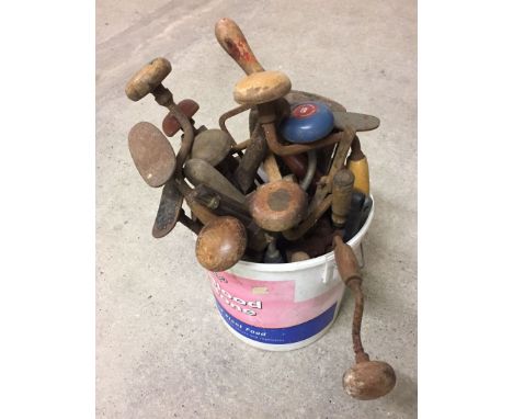 A tub of vintage tools.