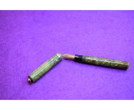 A Sheaffer Lifetime leverfill fountain pen in jade green with single band and ring to cap and white dot to barrel end having 