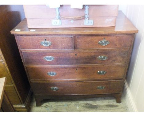 A 19th Century Oak chest of two short and three long drawers on bracket feet