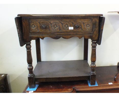 A 1950's Oak single drawer sofa table