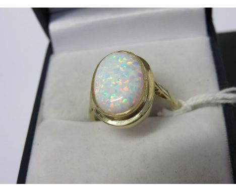 OPAL RING, large oval opal on 9ct yellow gold mount, size P/Q