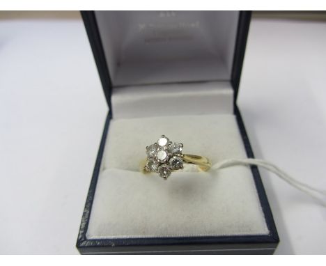 DIAMOND DAISY CLUSTER RING, 18ct yellow gold ring set a cluster of 7 diamonds, size J