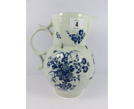18th CENTURY WORCESTER, cabbage leaf jug, blue transfer "Bouquet" pattern, rivetted repair, 8" height with crescent moon base