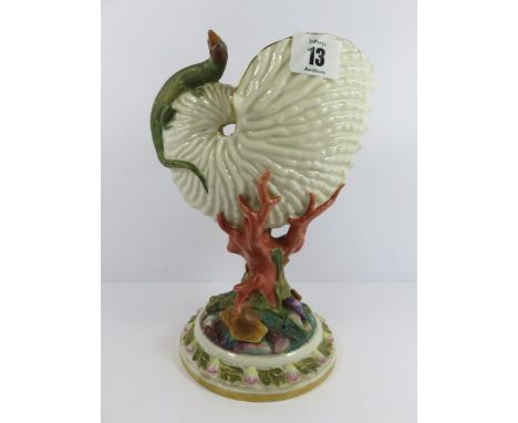 ROYAL WORCESTER SHELL VASE, Royal Worcester nautilus shell and coral support, 9" vase with lizard embellishment, date letter 