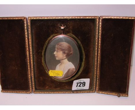 PORTRAIT MINIATURE, in a folding metal frame mount with velvet lined case