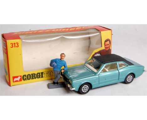 Corgi Toys, 313 Ford Cortina GXL, light metallic green with black roof, white interior with Whizzwheels and Graham Hill figur