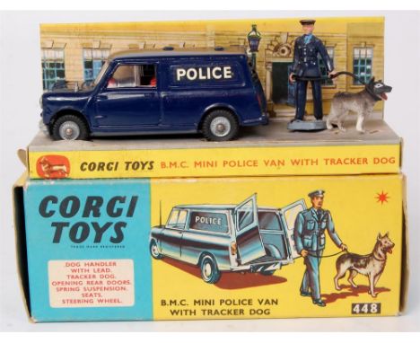 Corgi Toys, 448 Austin police Mini van with tracker dog, dark blue body with red interior, cast hubs, with policeman and dog 