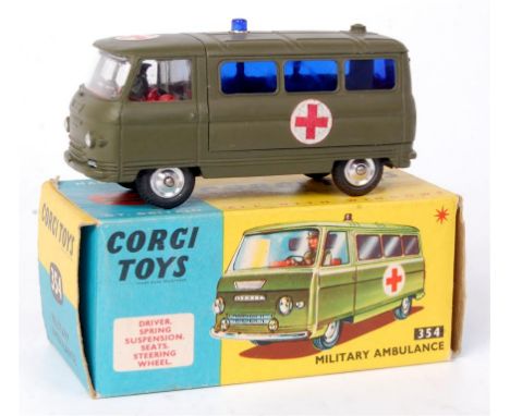 Corgi Toys, 354 Commer military ambulance, military green body with red interior, Red Cross stickers with blue light and spun