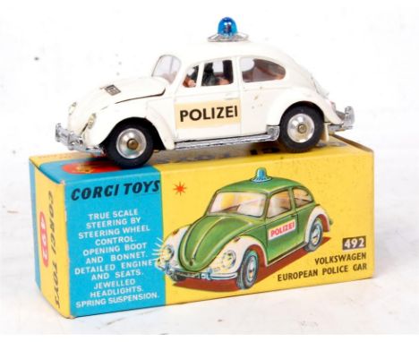 Corgi Toys, 492 VW European Police car, white body with light brown interior, 2 figures, with Polizei to doors and blue light