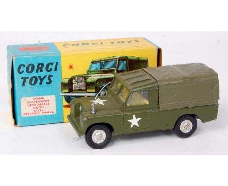 Corgi Toys, 357 Military Land Rover, military green with lemon interior, no driver, spun hubs, in the original blue and yello