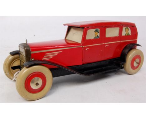 Chad Valley, England tinplate clockwork Vintage Car - red Saloon Car has detailed tinprinting, with silvered windows and pass
