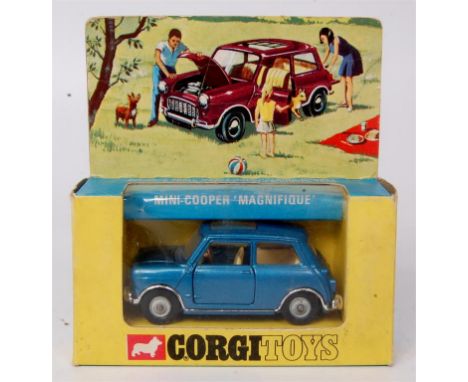 Corgi Toys, 334 Mini Cooper Magnifique, metallic blue body with jewelled headlights and Sunshine roof, in the original blue a