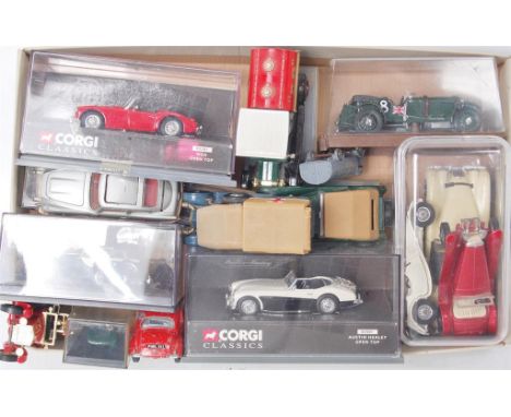 A quantity of loose, boxed and plastic cased diecast and resin vehicles, mixed manufacturers to include; Corgi, Piccolini, Ma