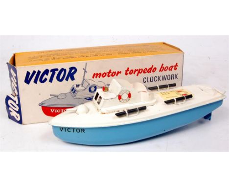 Sutcliffe boats, Victor Motor Torpedo boat, white and light blue body with life ring transfers, with bung and key, in the ori