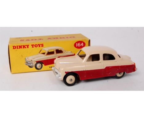 Dinky Toys, 164 Vauxhall Cresta Saloon, maroon lower body with cream upper body and hubs, in the original all-card yellow pic