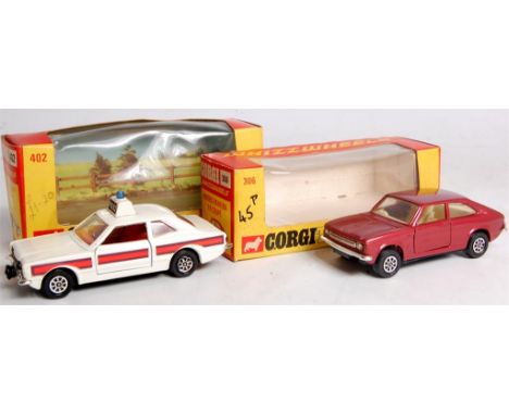 Corgi Toys, Whizzwheels boxed diecast group comprising of No.306 Morris Marina 1.8 coupe in metallic red with cream interior 