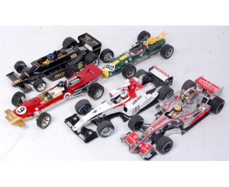 5 assorted Formula 1 1/18th scale diecast and plastic racing cars, by Minichamps, Carousel 1 and others, all are loose exampl