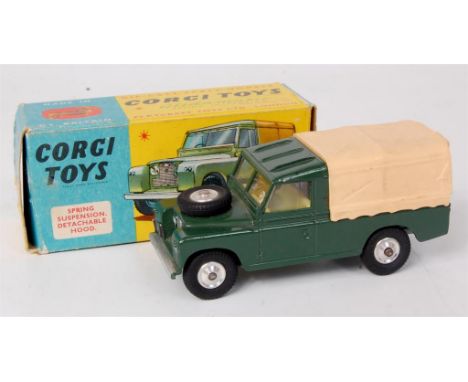 Corgi Toys, 438 Land Rover 109 WB, dark green body with lemon interior, cream/apricot canopy with spun hubs, in the original 